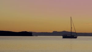 Sunset boat anchored